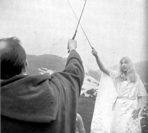 alex and maxine with crossed swords