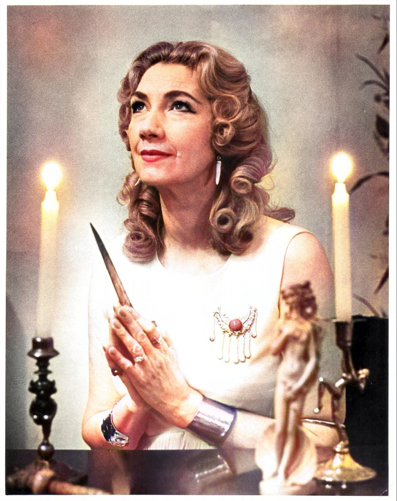 Patricia with athame candles and goddess statue