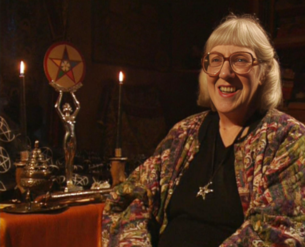 Doreen-being-interviewed-in-front-of-ritual-tools-2