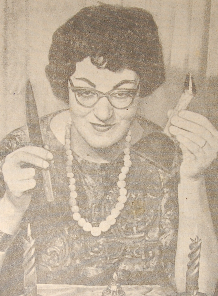 Doreen-showing-off-her-magical-tools-in-newspaper